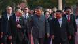 Xi, Putin, and Kim joke about living to 150 in hot-mic chat